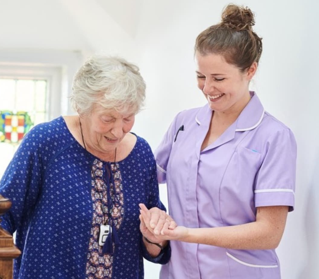 Support worker assisting resident